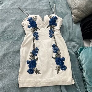Elegant White Dress with Blue Floral Embroidery